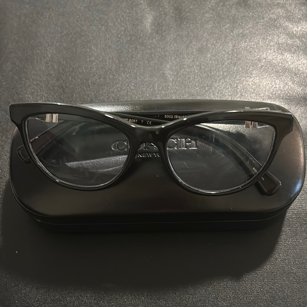 COACH black frame/silver buckle eye glasses with case